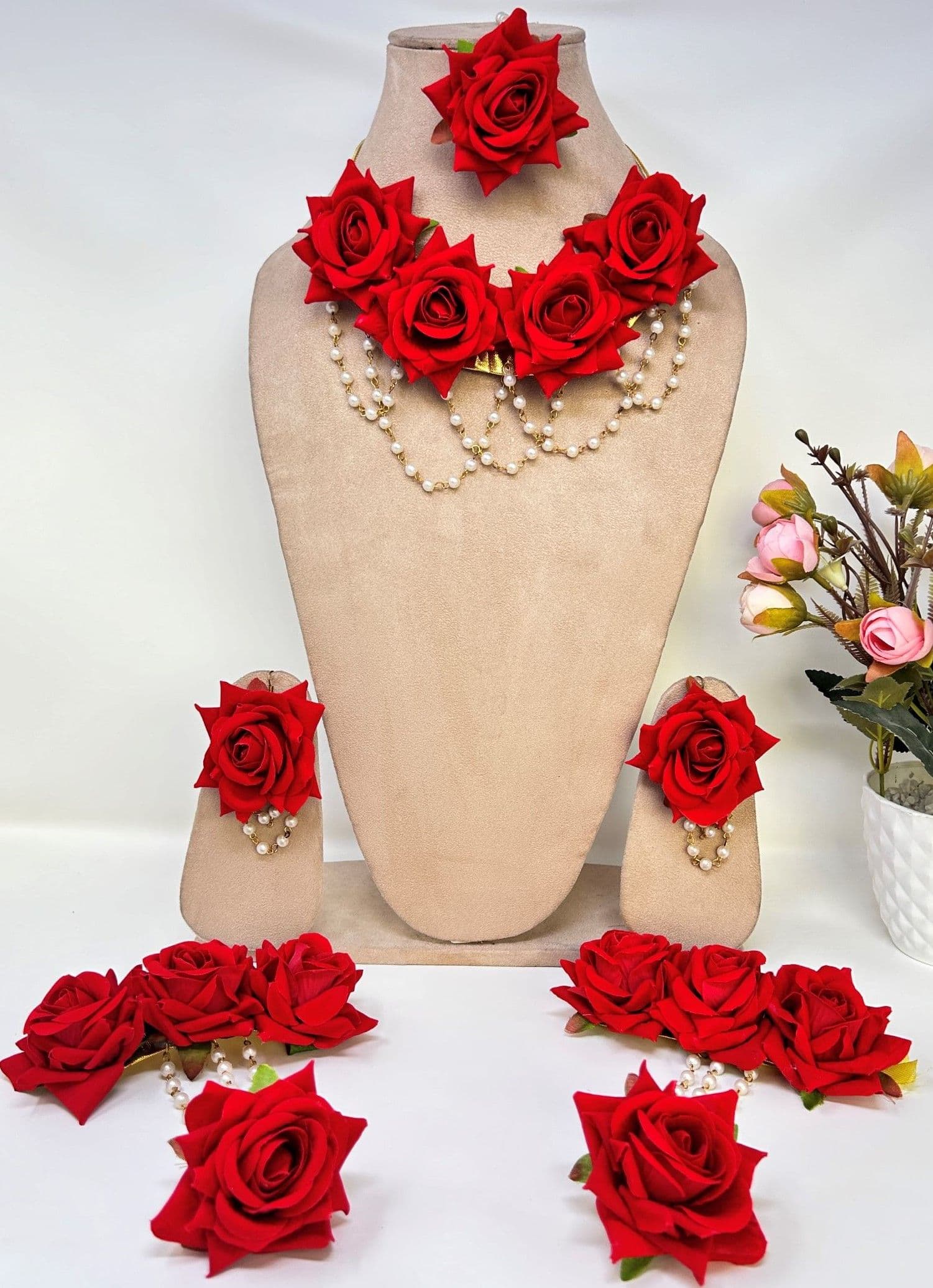 Bridal haldi jewellery set with red flower design ideal for weddings and mehndi